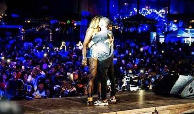 Wizkid and Tiwa Savage share a kiss on stage in Paris