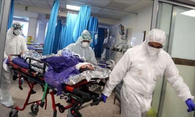 mergency workers being prepared before their contact with the body of a renal patient who had died of COVID-19 at LUTH on Friday