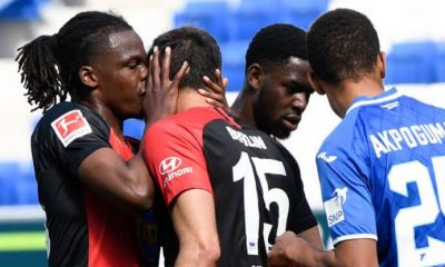 German defender denies kissing teammate as league resumes