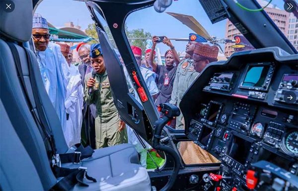 Arotile, Buhari and other dignitaries during the induction of combat helicopters in Abuja topnaija.ng