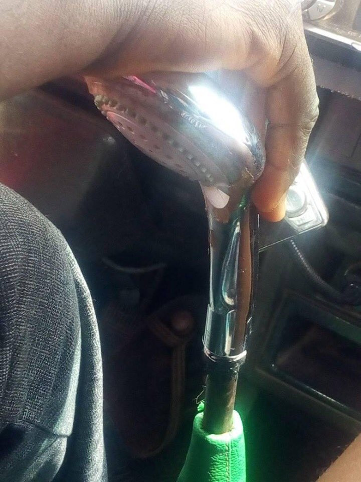 Hilarious moment when a bus driver was seen using a shower head instead of a gear stick [PHOTOS]