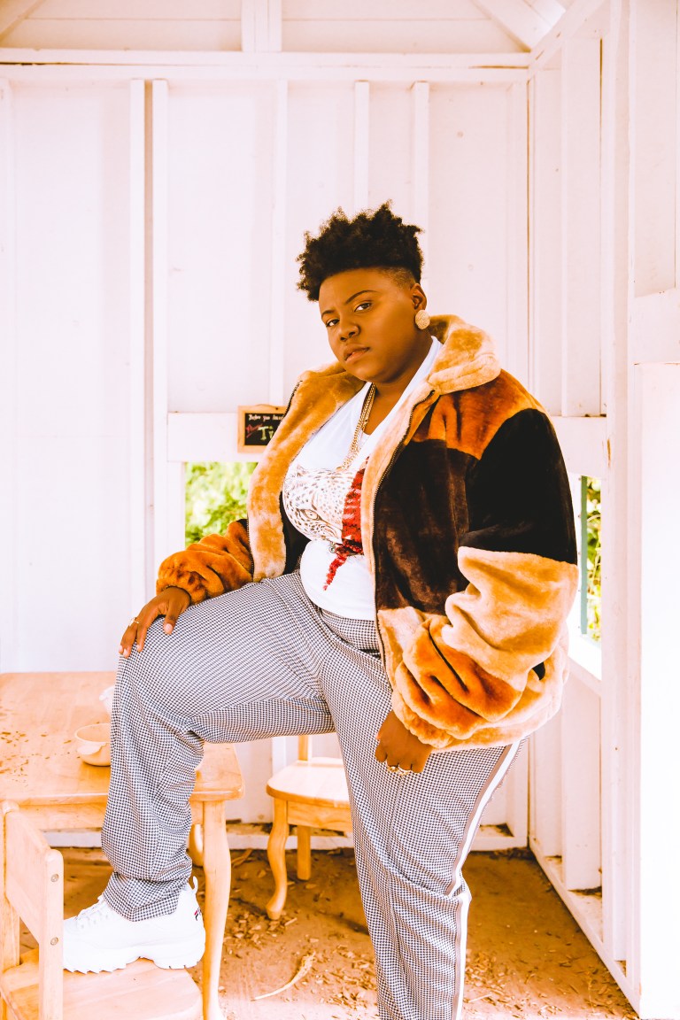 Fans react when Nigerian singer, Teni shared a throwback picture of her dressed like a female