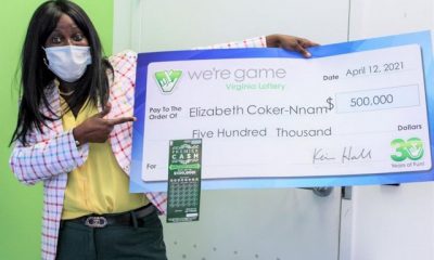 Elizabeth-Tutu-Coker-Nnam-with-her-prize-check.g