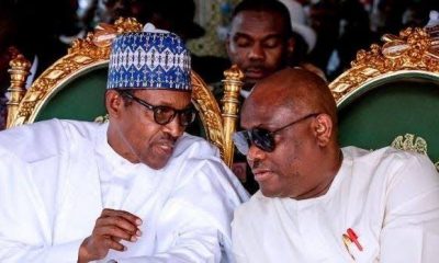 wike and buhari topnaija.ng