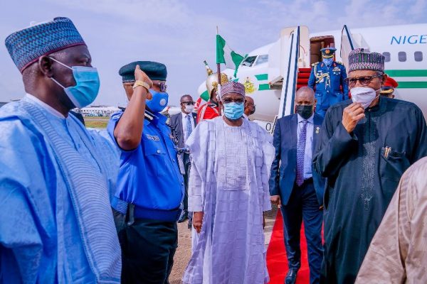 President Buhari returns to Abuja after Paris trip [PHOTOS]