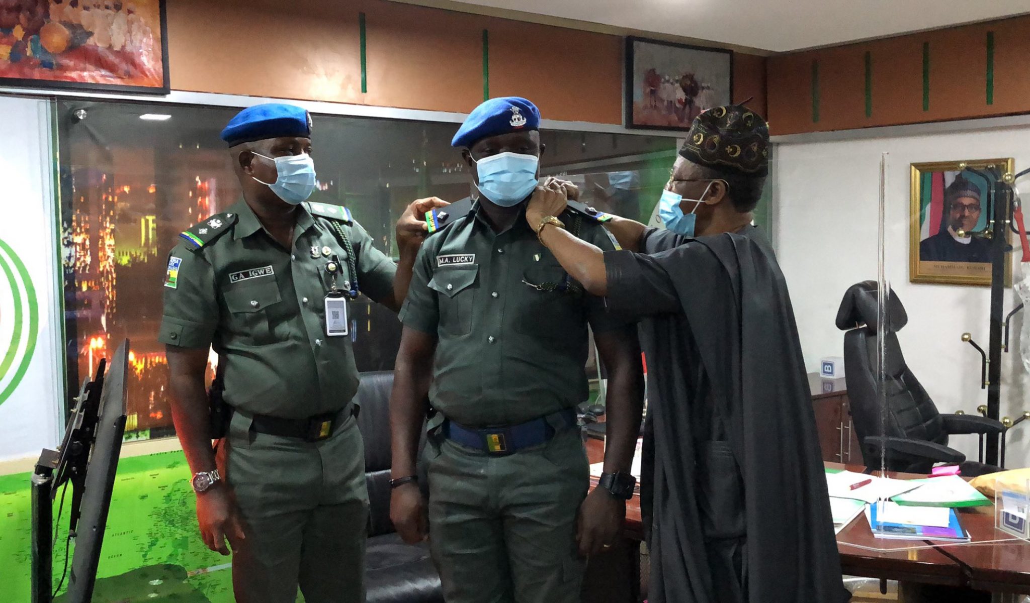 Lai Mohammed with police