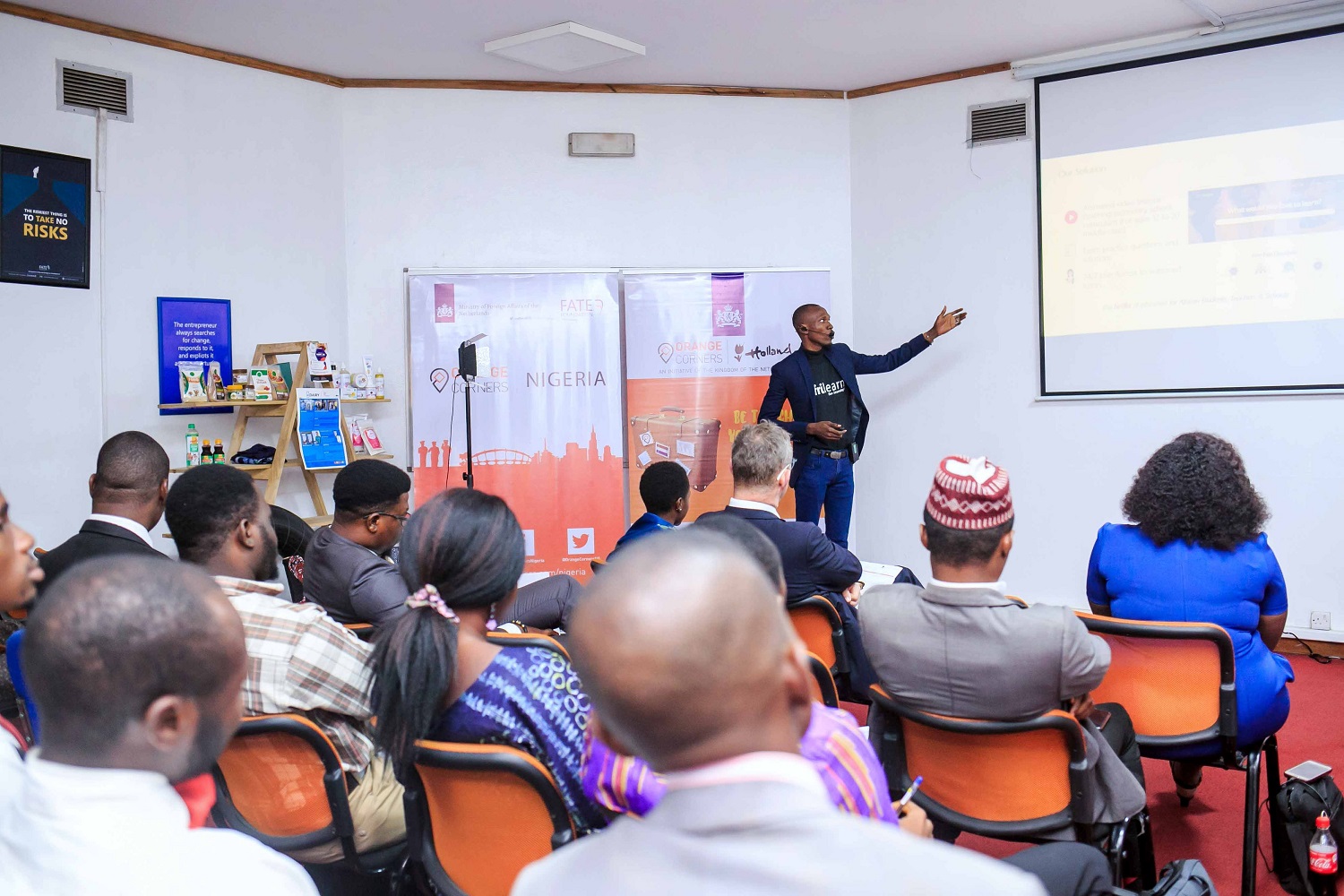 Young African entrepreneur founder pitching a startup business to investors