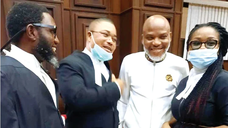 Leader of Indigenous People of Biafra, Nnamdi Kanu, with his lawyers and others during his trial at the Federal High Court in Abuja.