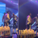 wizkid dances with fan on stage