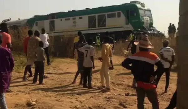 Crowd Gathers As Lady Rams Into A Speeding Train With Her Car [Video]