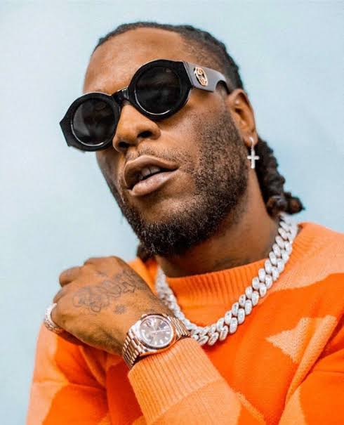 Moment Burna Boy Kicks Off Fan's Attempt To Come On Stage