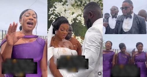 Guests brave heavy downpour to celebrate couple's outdoor wedding (Video)