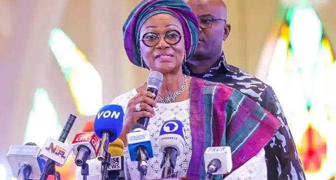 Oluremi Tinubu, Wife of Nigeria's President, Makes First Official Appearance at First Lady's Office Today, Monday, June 5, marked a significant milestone as Oluremi Tinubu, the wife of Nigeria's President, Bola Tinubu, made her first official appearance at the office of the First Lady. Mrs. Tinubu's visit to the First Lady's office was met with a warm reception by the Permanent Secretary of the State House, Tijjani Umar, and other Heads of Units in the First Lady's Office. Accompanied by her security aides, Mrs. Tinubu was taken on a tour of the various offices within the First Lady's wing, including the Administrative, ICT, Catering, Media, and Protocol Units. This visit signifies Mrs. Tinubu's active involvement and engagement in her role as the wife of the President. Born on September 21, 1960, to an Itsekiri mother and a Yoruba father, Mrs. Tinubu holds a Bachelor of Science Degree in Education from the University of Ife. Throughout her career, she has pursued further education by undertaking several courses in various higher institutions. Mrs. Tinubu's previous roles include serving as the wife of the Lagos State Governor between 1999 and 2007. Following her time as the First Lady of Lagos State, she was elected Senator representing Lagos Central in the Senate. During her tenure, she executed numerous philanthropic activities to alleviate the plight of vulnerable people in her constituency, demonstrating her commitment to serving the people. In addition to her involvement in governance and public service, Mrs. Tinubu is a prominent chieftain of the All Progressives Congress (APC), the political party that played a pivotal role in bringing her husband to power as Nigeria's President.