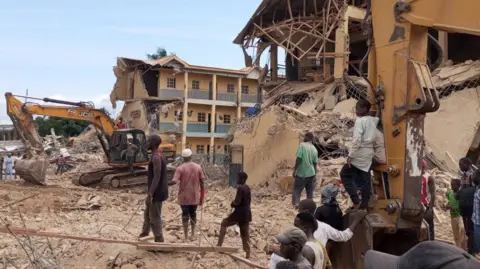 Father, 2-year-old son die in building collapse